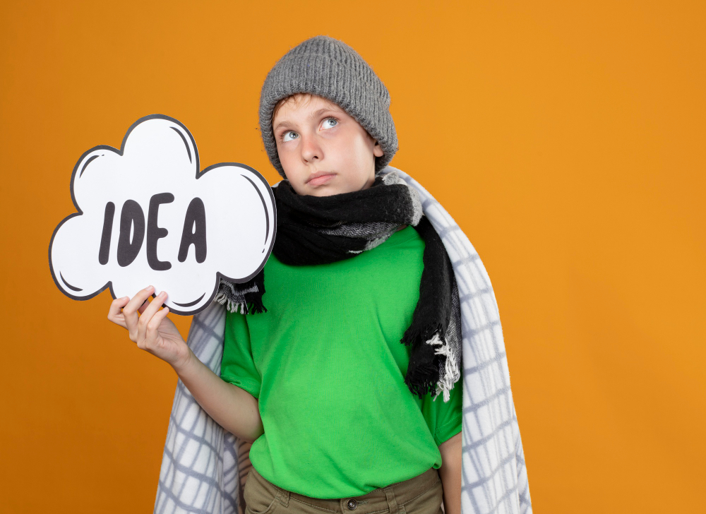 A child working on their first business idea