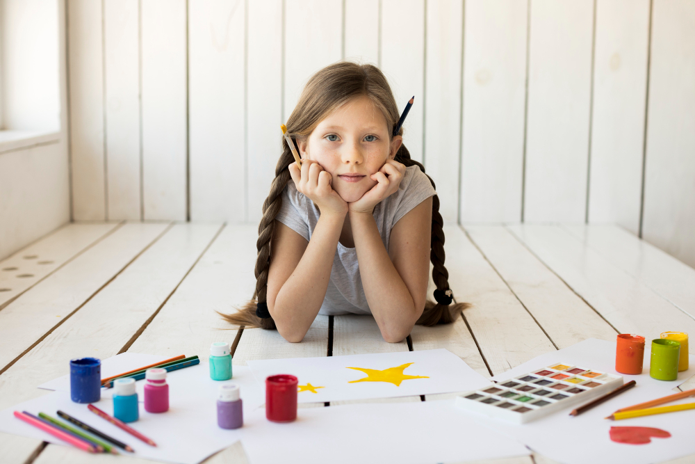 child-showing-creative-thinking-while-building-project